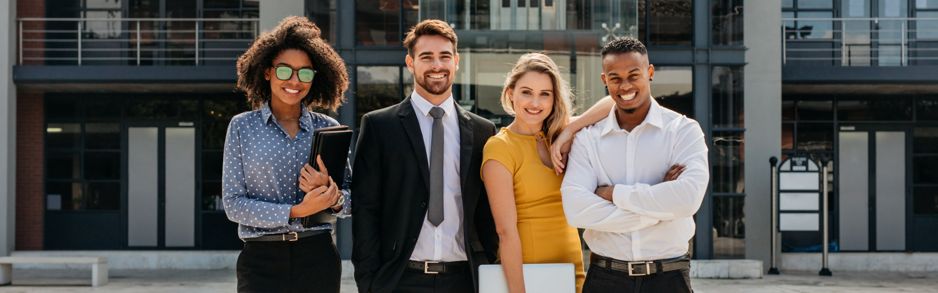 Professionals Smiling outside