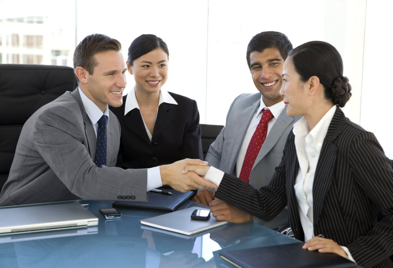 Man and woman shaking hands