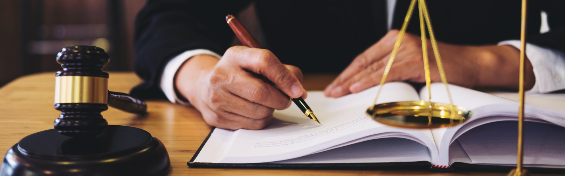 lawyer highlighting text on the book